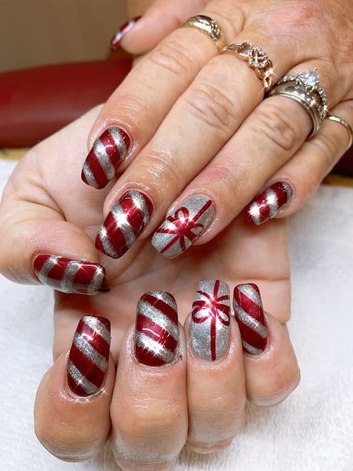 Red and white striped holiday nail art