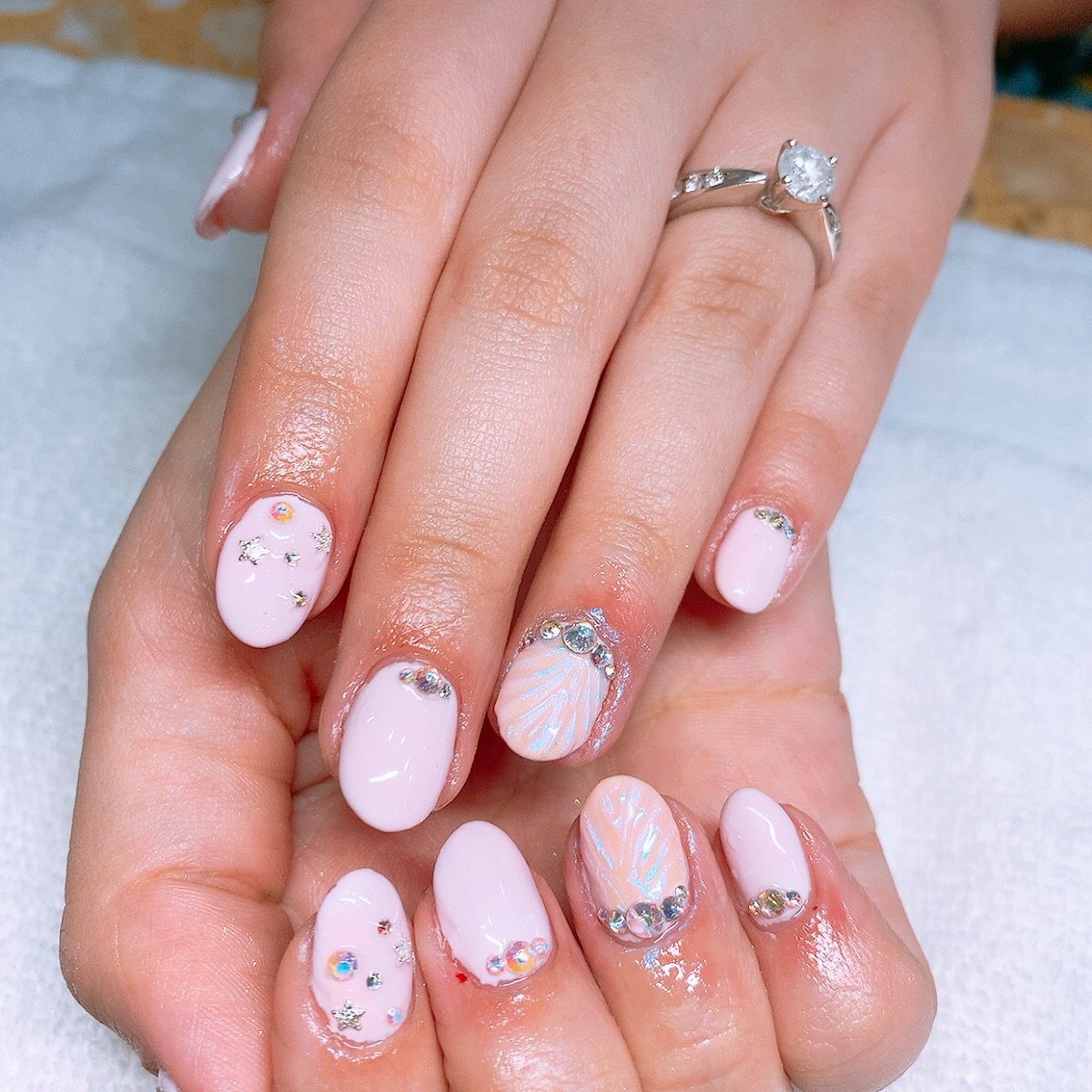 Pink nails with white polka dots